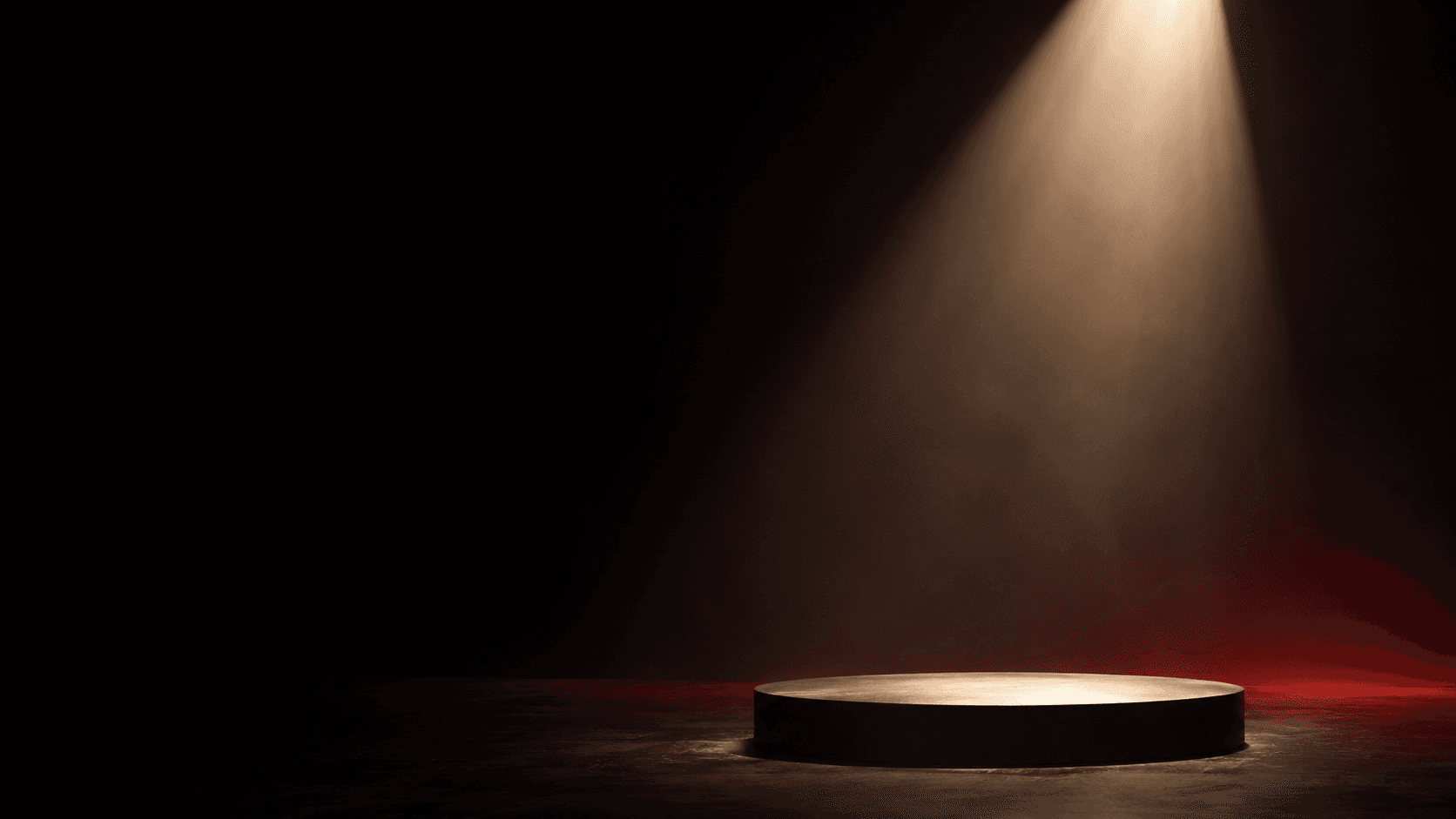 An illuminated podium waiting for a student speaker